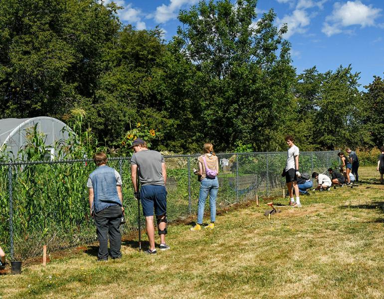 Volunteers planting pollinator habitat at the Portland People's Garden