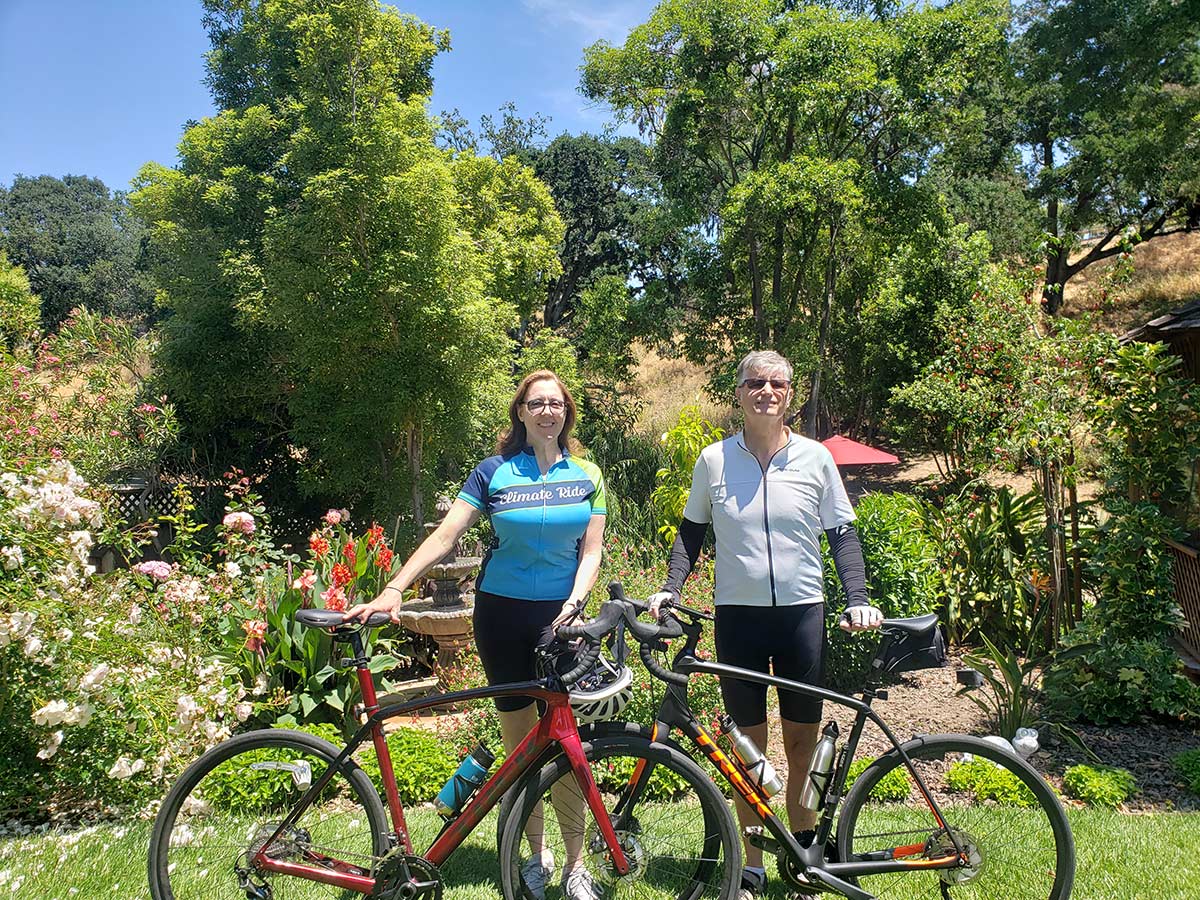 Justine and husband with bikes