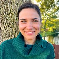 Jacqueline Buenrostro smiling in front of an outdoor park